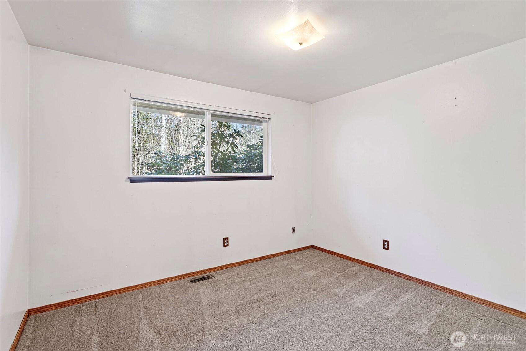 23829 Southeast 208th Street Maple Valley, WA 98038 - Photo 15 of 32 an empty room with a window