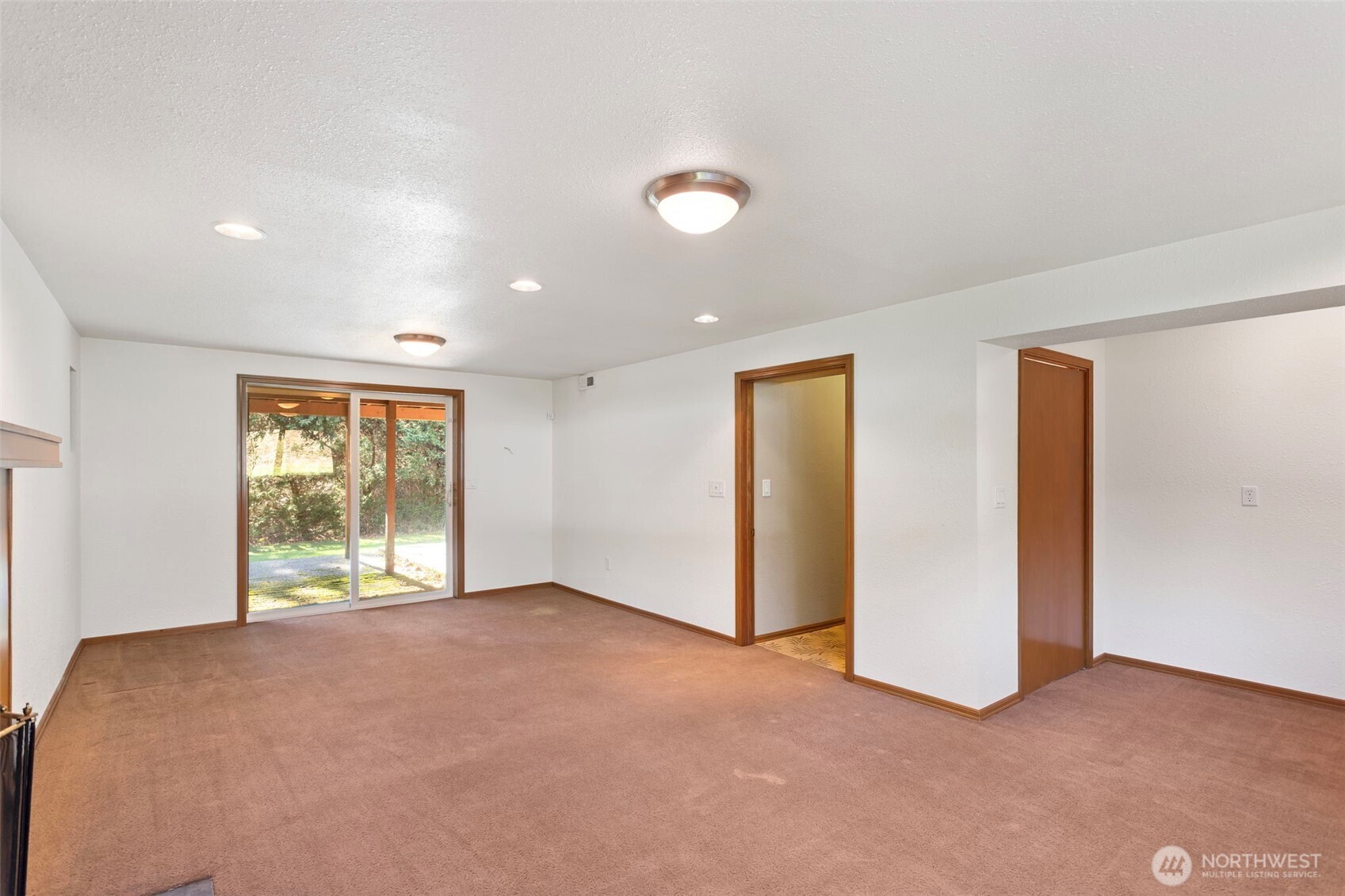 23829 Southeast 208th Street Maple Valley, WA 98038 - Photo 21 of 32 a view of an empty room with a window