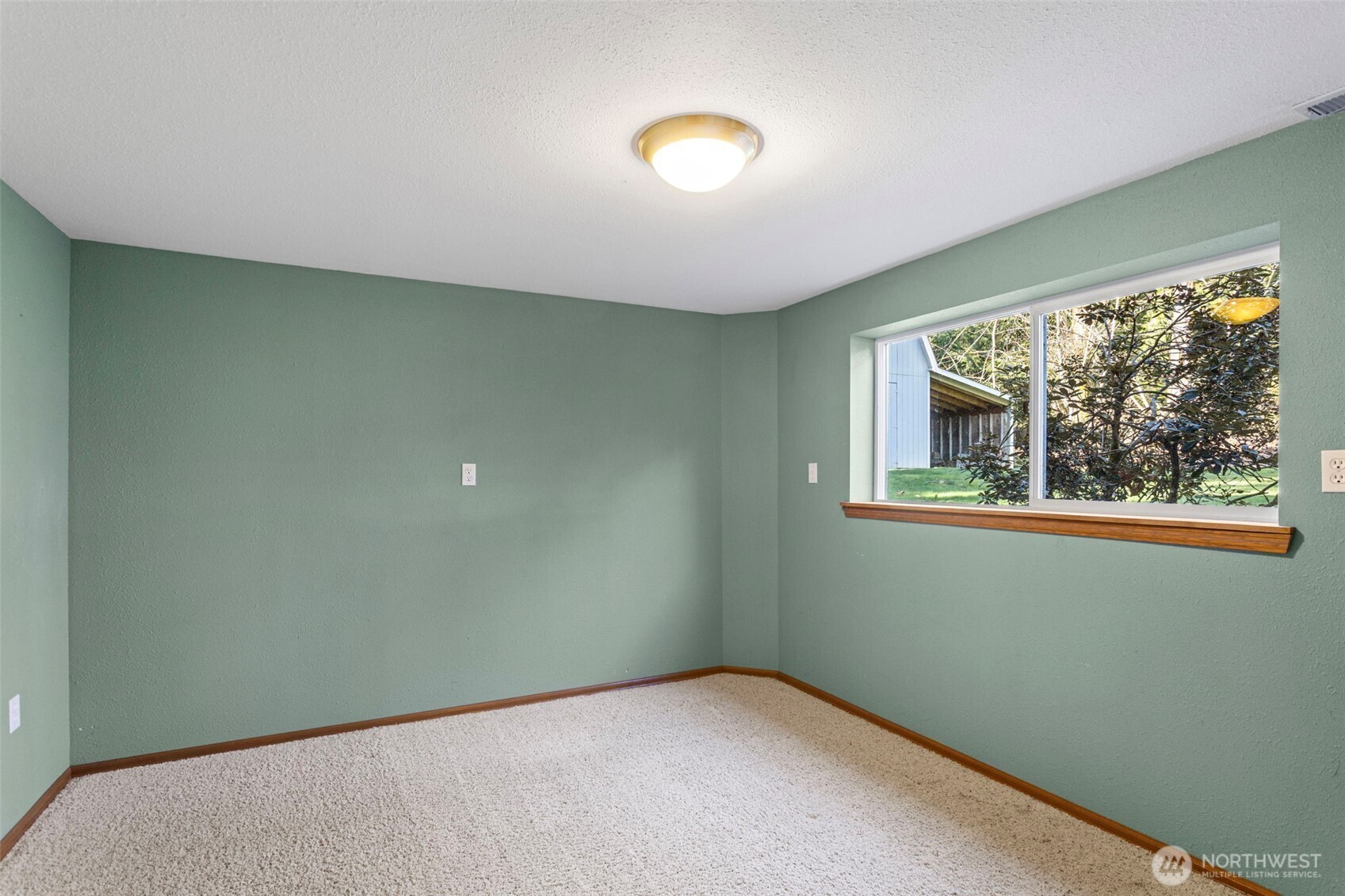 23829 Southeast 208th Street Maple Valley, WA 98038 - Photo 25 of 32 a view of an empty room with a window