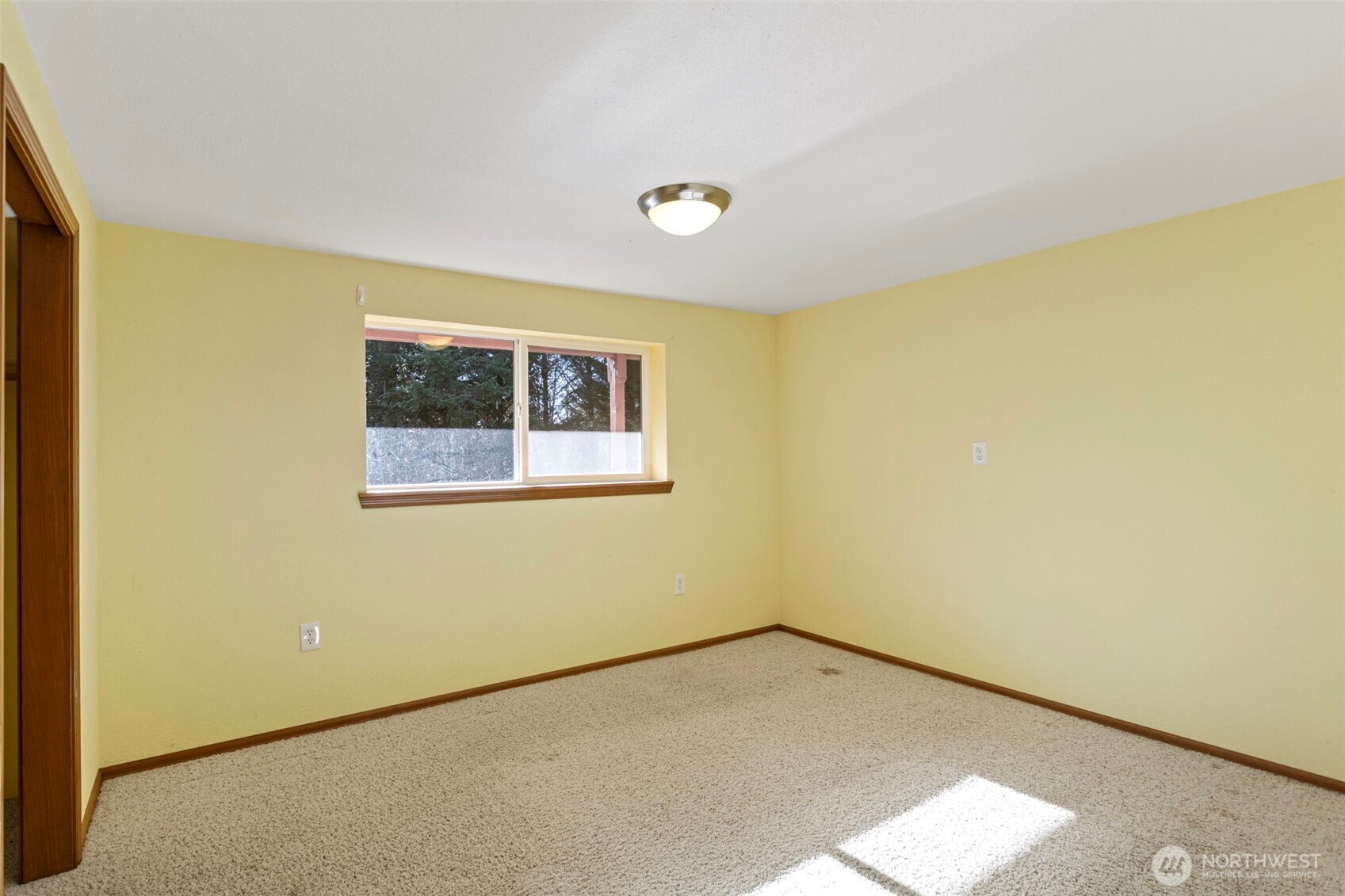 23829 Southeast 208th Street Maple Valley, WA 98038 - Photo 26 of 32 a view of an empty room with a window