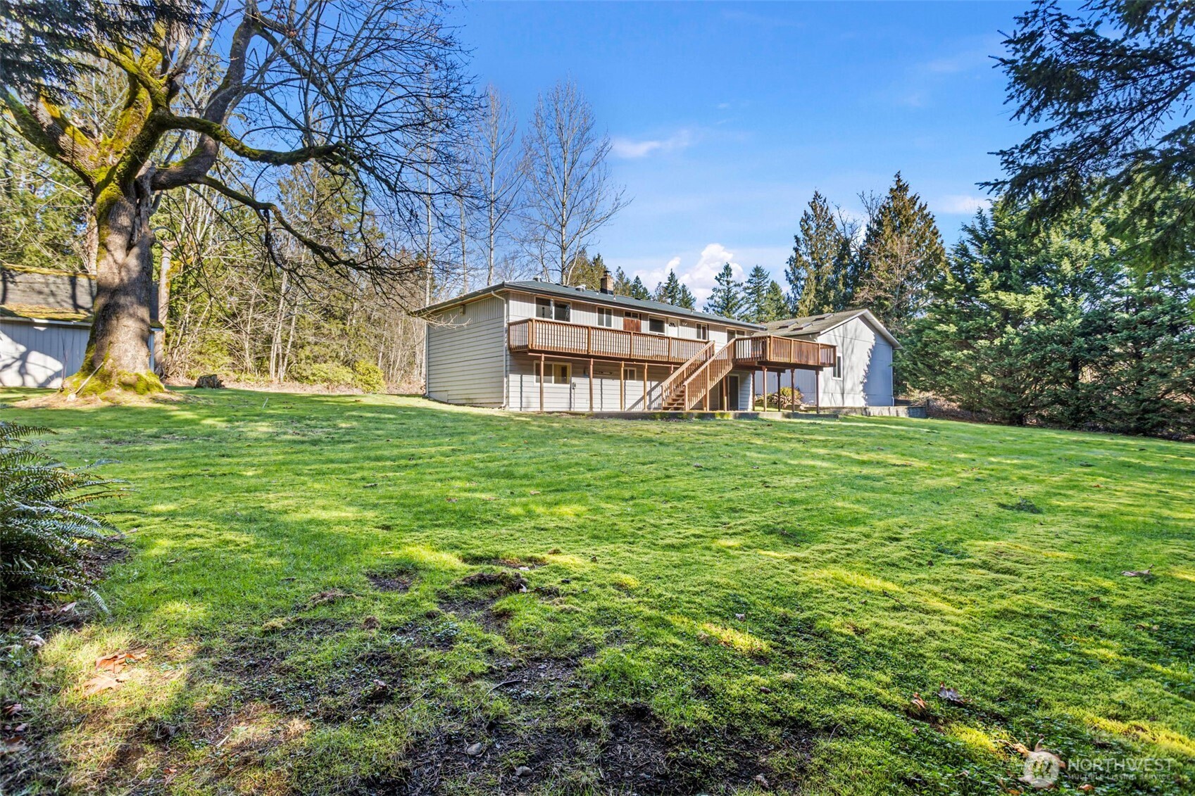 23829 Southeast 208th Street Maple Valley, WA 98038 - Photo 30 of 32 a view of a house with a big yard