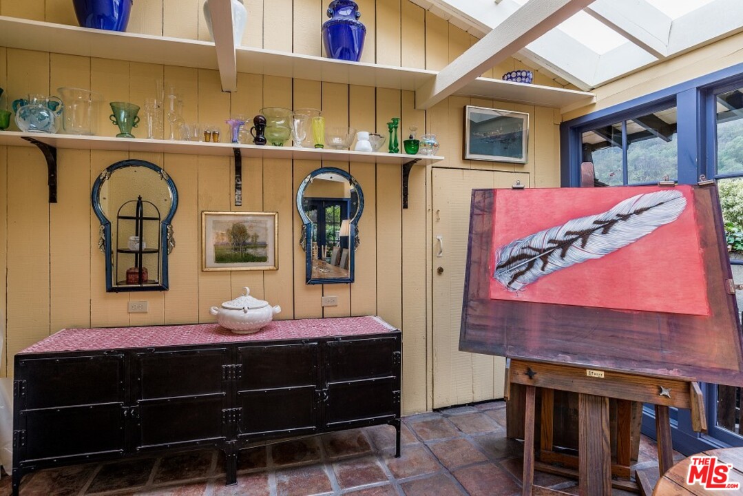 3266 Mandeville Canyon Road Los Angeles, CA 90049 - Photo 7 of 37 a room with furniture