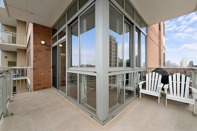 230 West Division Street, Unit 1005 Chicago, IL 60610 - Photo 11 of 15 a view of balcony with furniture