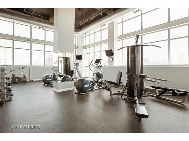 230 West Division Street, Unit 1005 Chicago, IL 60610 - Photo 15 of 15 a view of a room with gym equipment