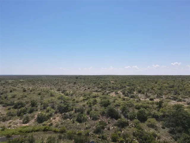 a view of a lake with mountains in the background
