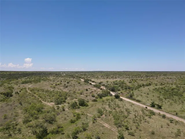 a view of a city from a yard