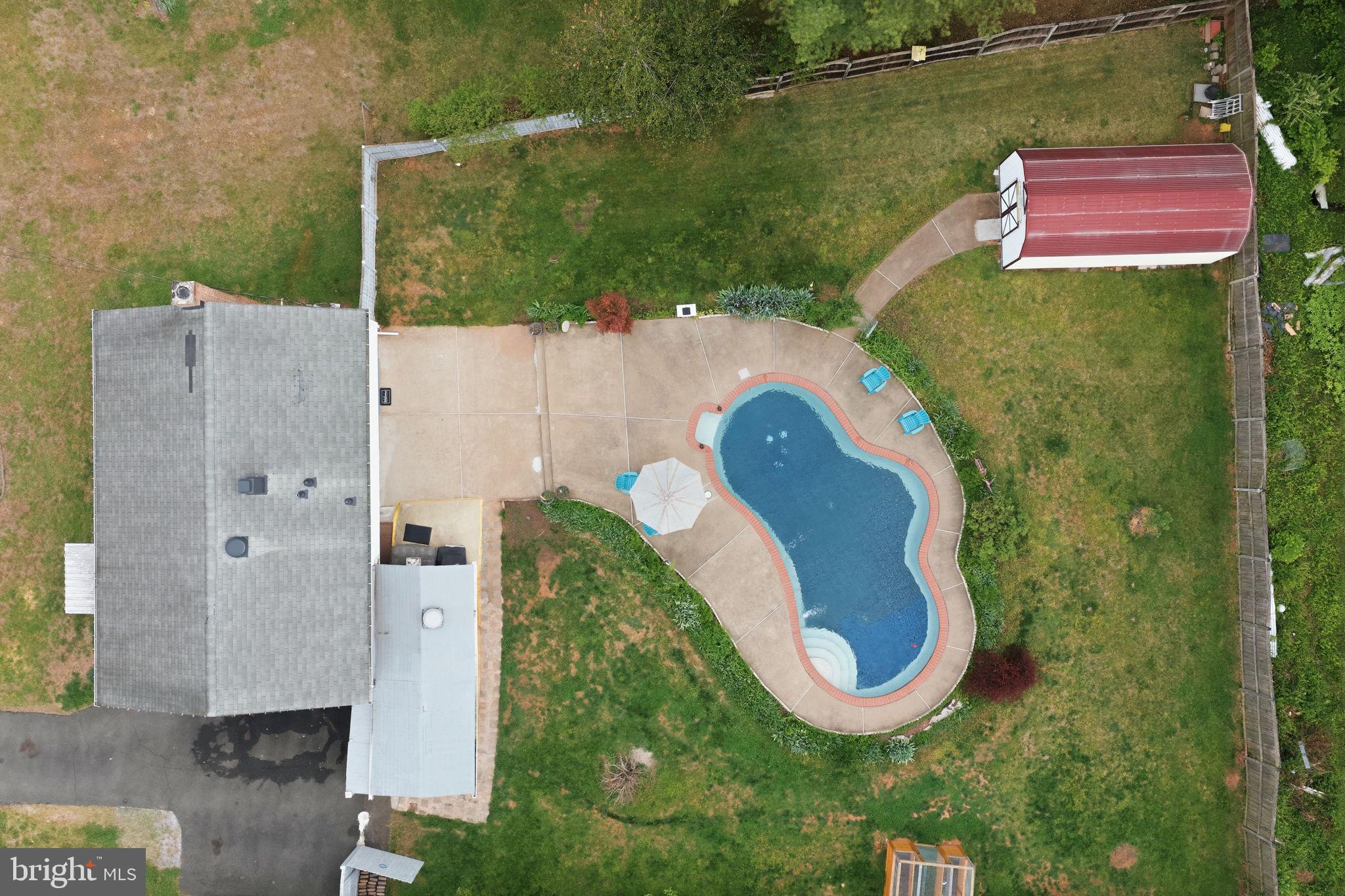 9609 Norfolk Street Manassas, VA 20109 - Photo 37 of 37 an aerial view of a house with a swimming pool