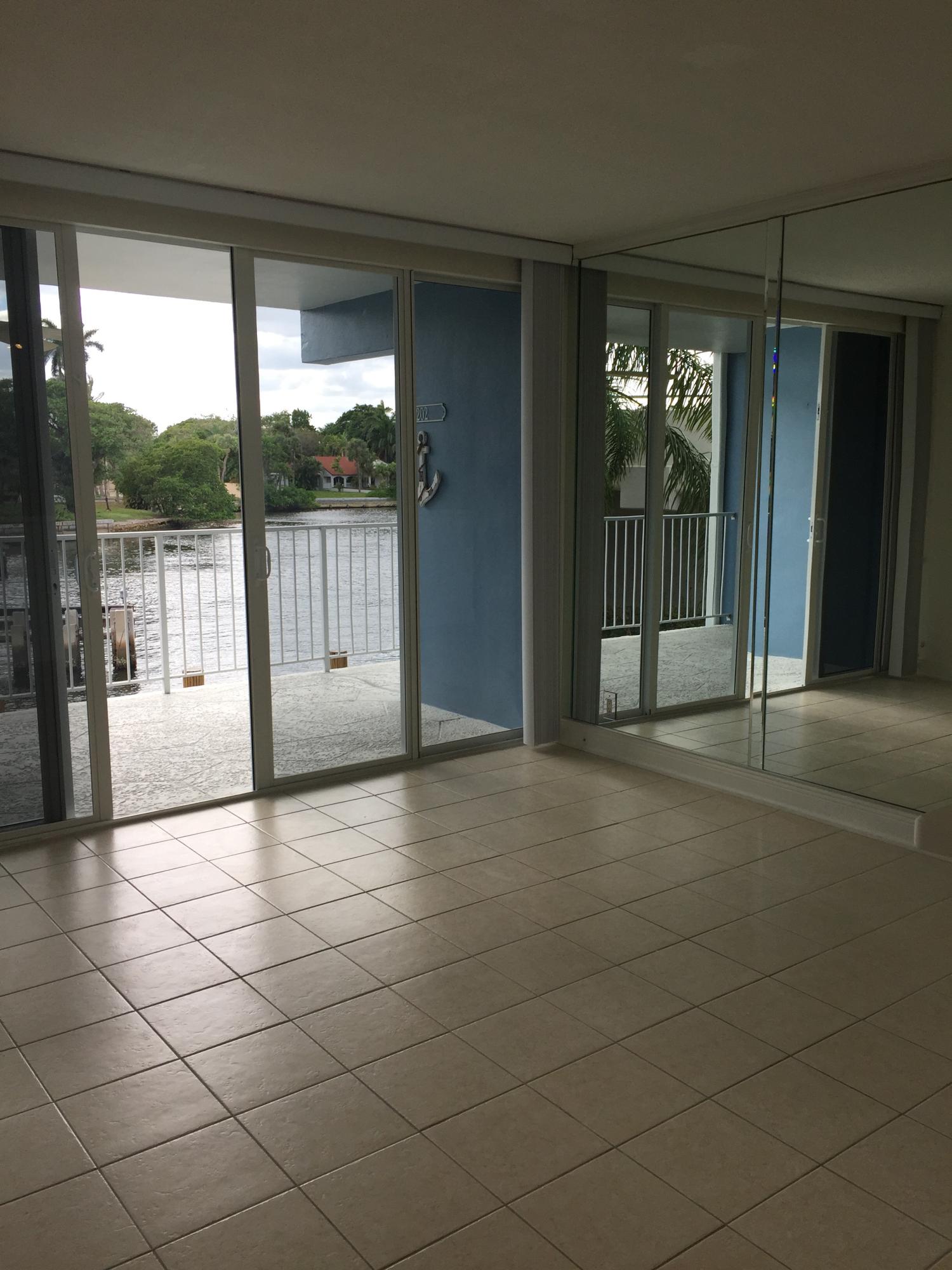 55 Northeast Spanish Trail, Unit 202 Boca Raton, FL 33432 - Photo 7 of 27 great room
