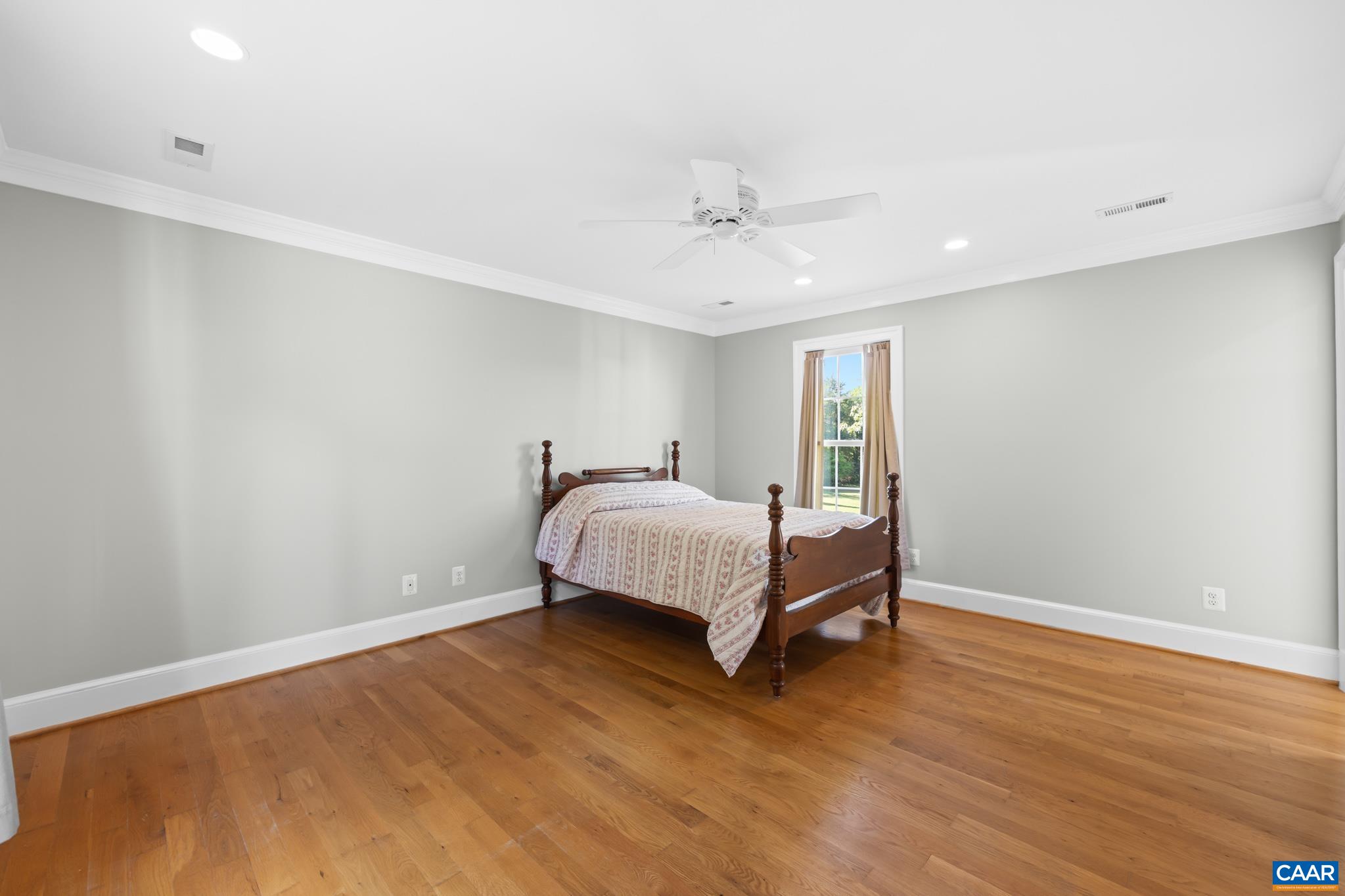 480 Dawsonville Road Barboursville, VA 22923 - Photo 29 of 55 a spacious bedroom with a bed and a table