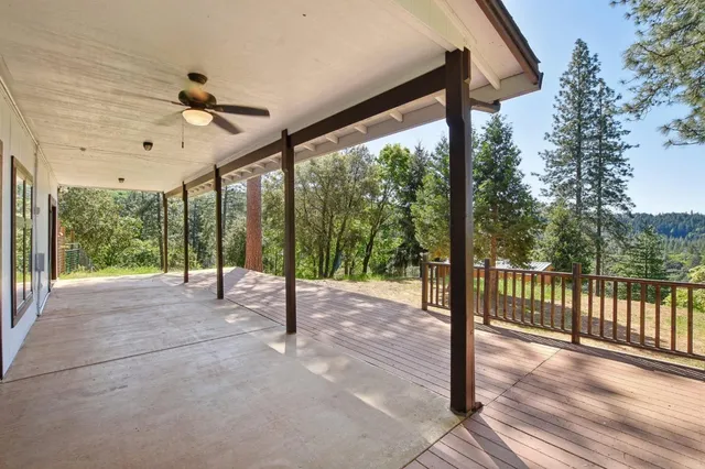a view of a room with balcony and porch