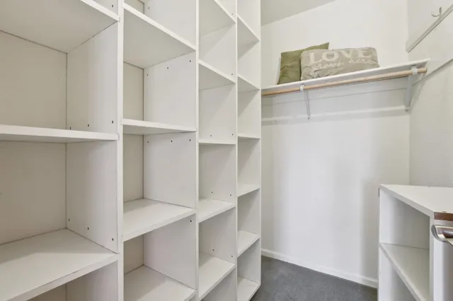 a view of an empty walk in closet