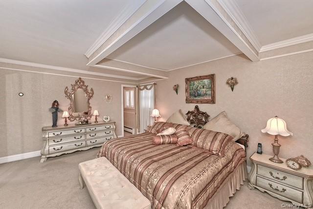 8 Brookstan Road Nesconset, NY 11767 - Photo 21 of 35 a bedroom with a bed and ceiling fan