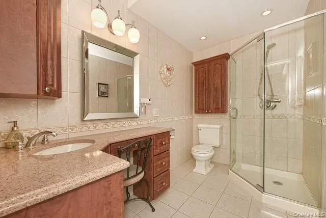 a spacious bedroom with a bed and a window