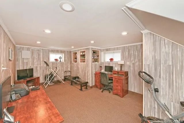 a front view of house with yard and outdoor seating