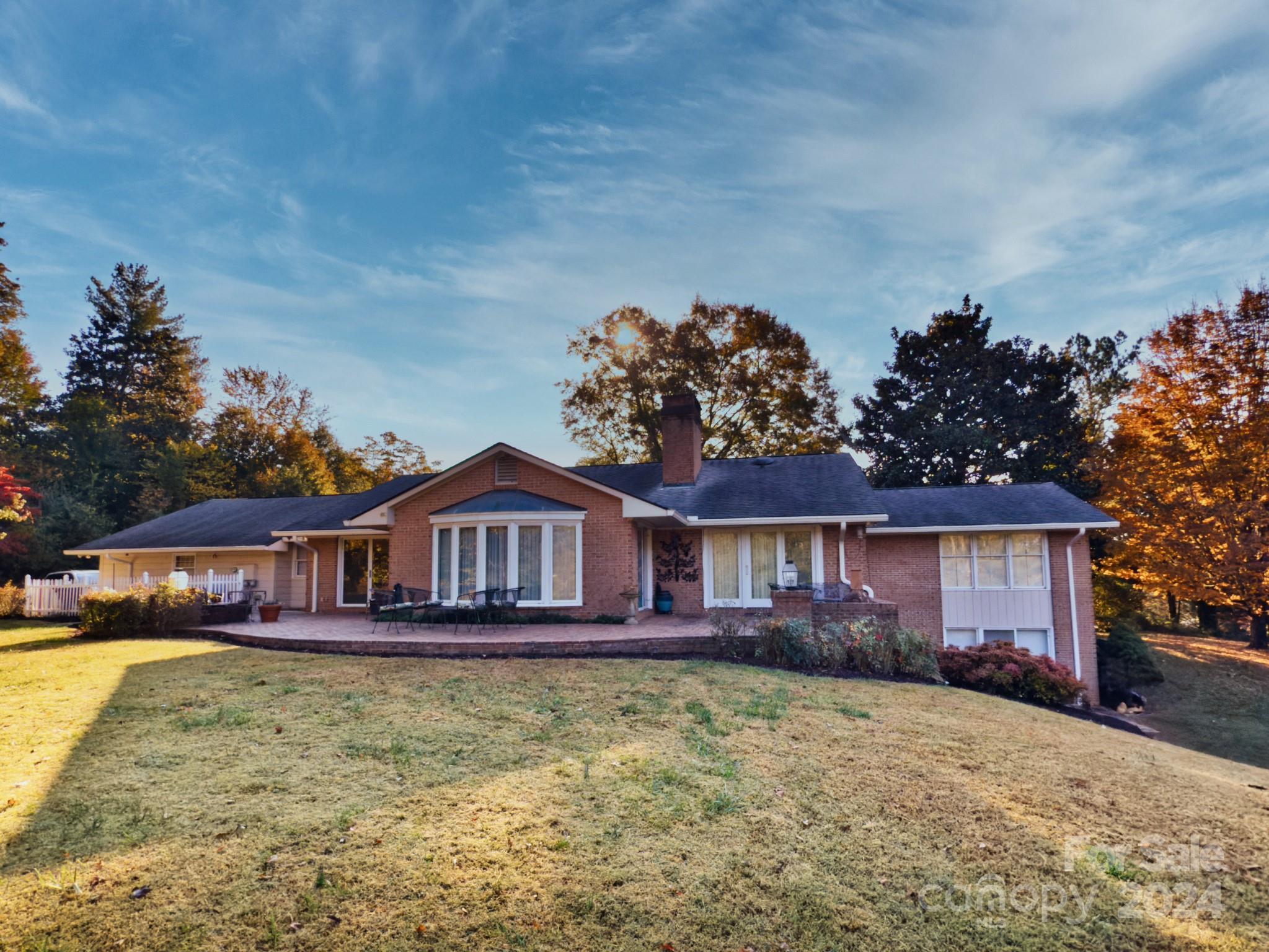 501 Hooper Creek Road Tryon, NC 28782 - Photo 10 of 34 front view of a house with a yard