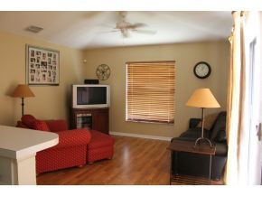 2513 Southern Melbourne, FL 32901 - Photo 3 of 12 a living room with furniture and a flat screen tv