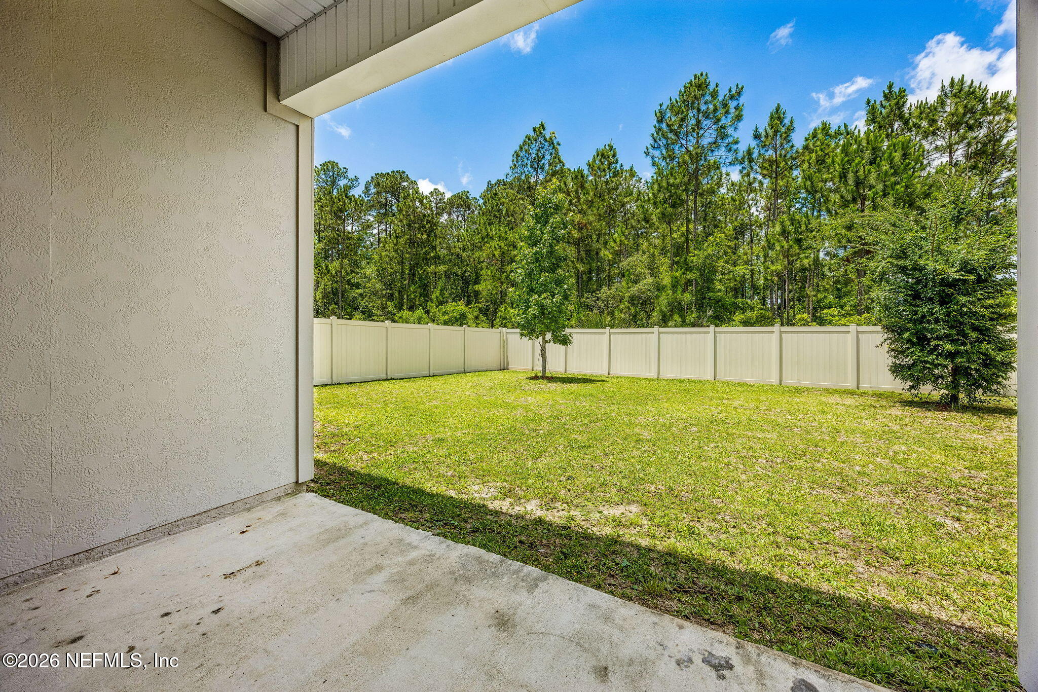 65908 Edgewater Drive Yulee, FL 32097 - Photo 32 of 49 Covered Rear Porch