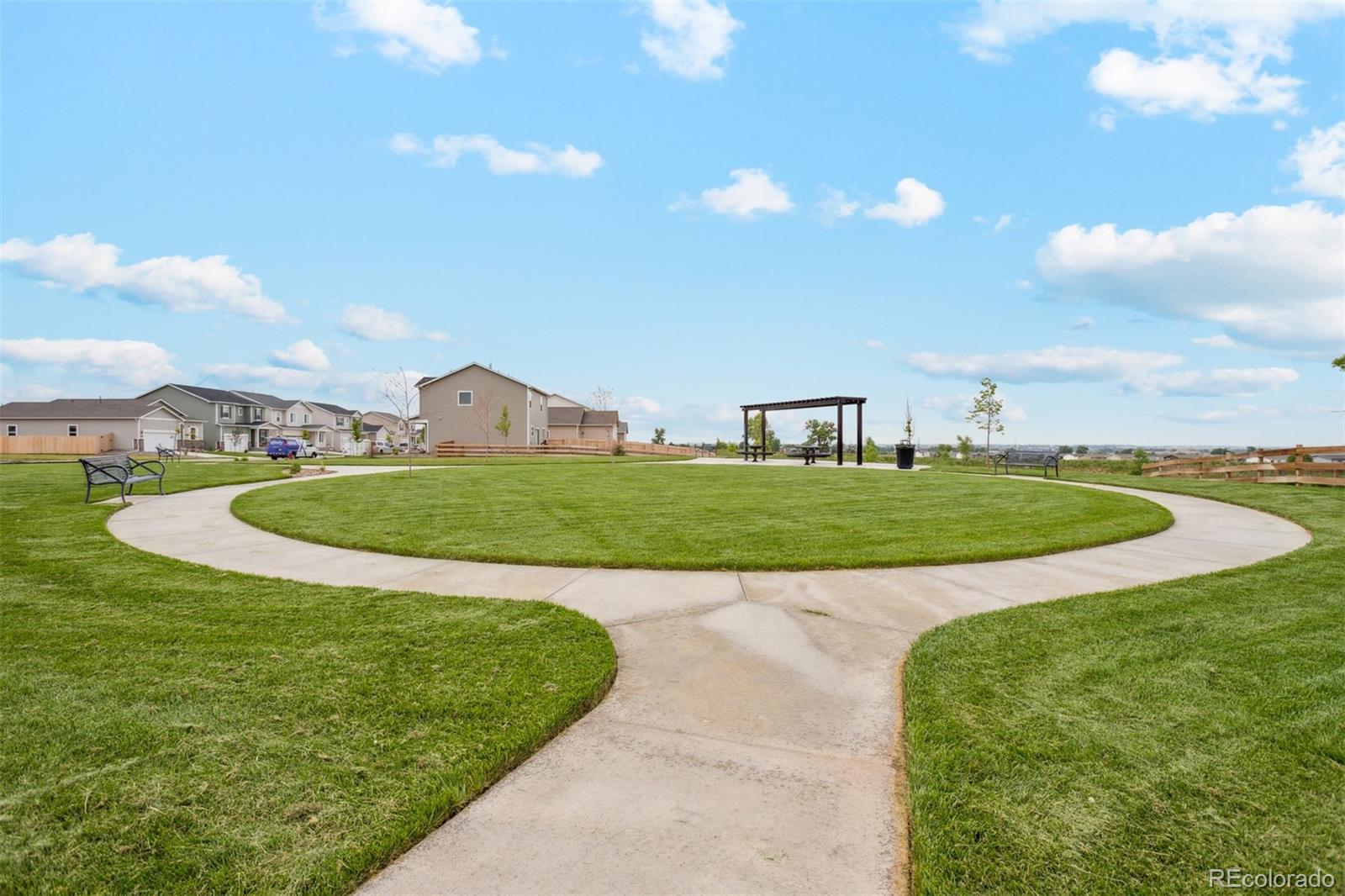 2220 Christina Street Fort Lupton, CO 80621 - Photo 23 of 42 a view of a house with a big yard
