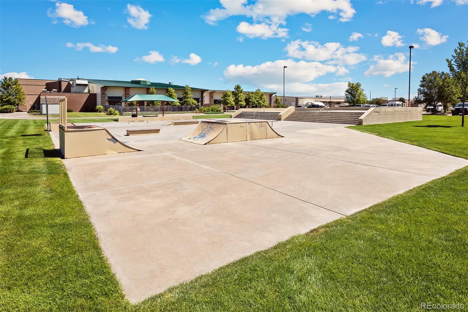 2220 Christina Street Fort Lupton, CO 80621 - Photo 42 of 42 a view of a patio with a yard