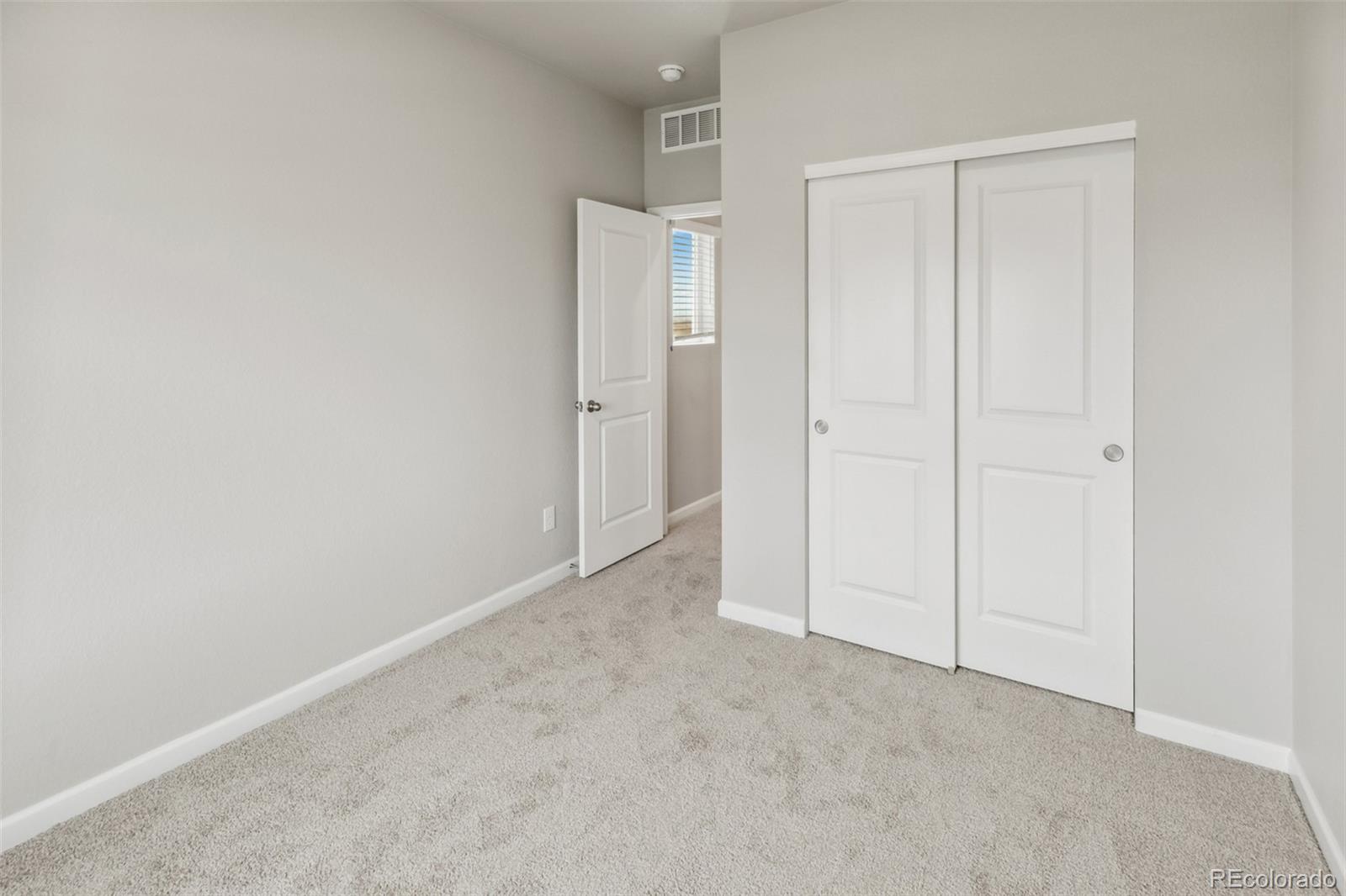 2220 Christina Street Fort Lupton, CO 80621 - Photo 9 of 42 an empty room with closet area