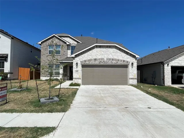 a front view of house with yard
