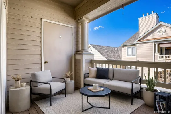 a building outdoor space with patio furniture