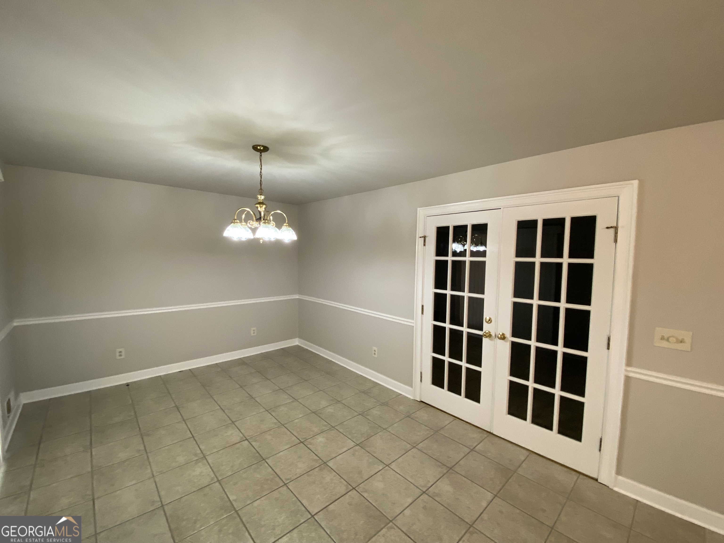 6092 Prestige Valley Road Morrow, GA 30260 - Photo 10 of 11 a view of an empty room with a window