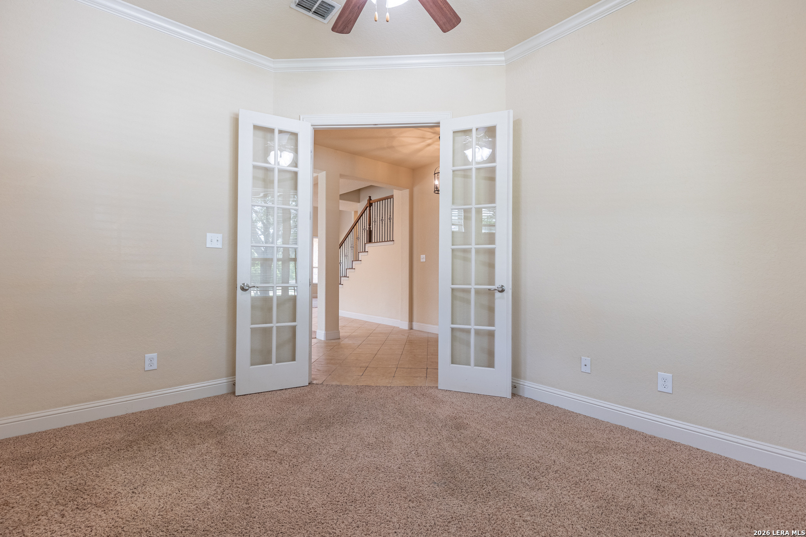 8103 Mystic Chase Boerne, TX 78015 - Photo 5 of 49 an empty room with closet and a chandelier fan
