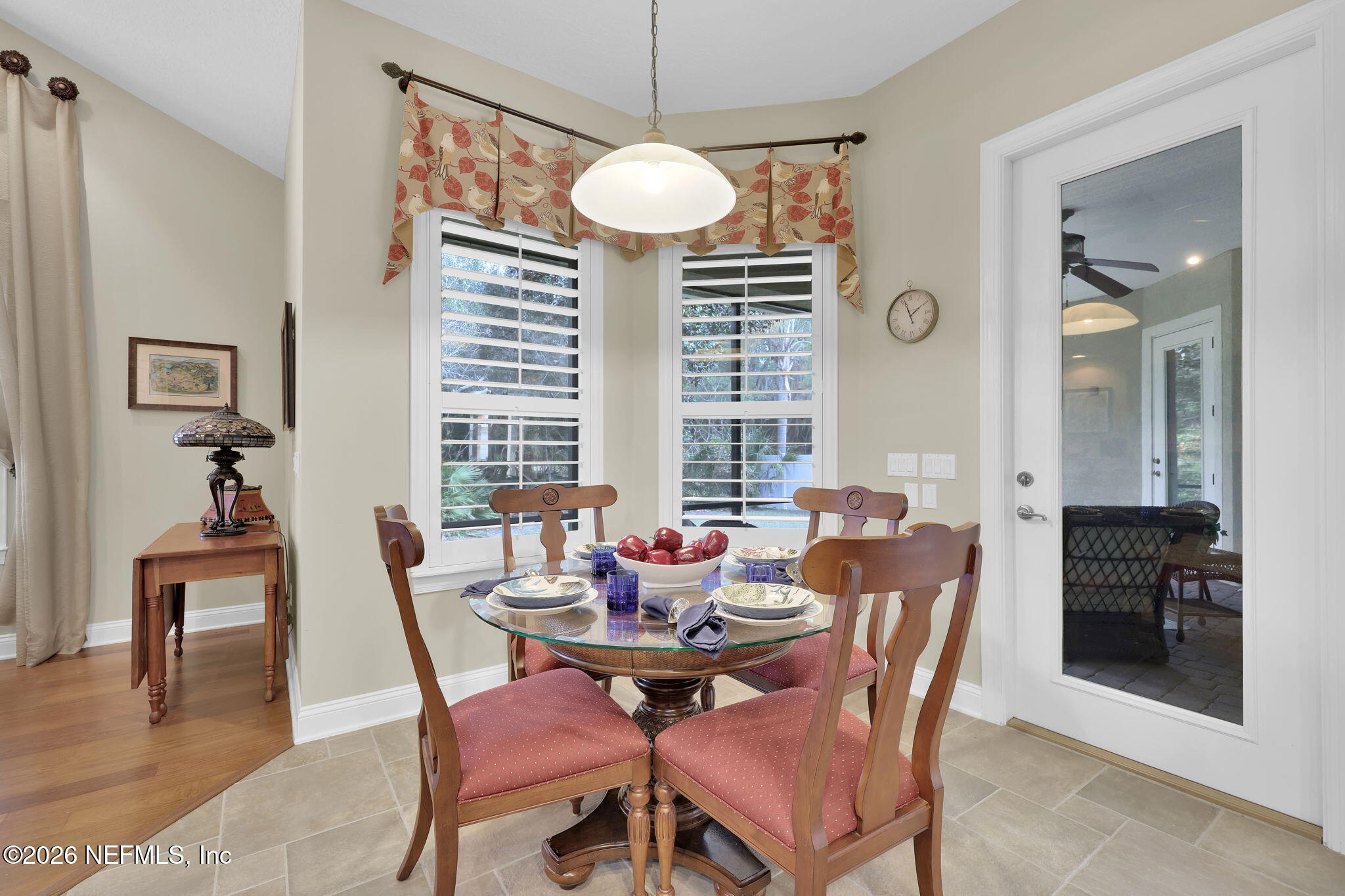 549 Sebastian Square St. Augustine, FL 32095 - Photo 16 of 51 a dining room with furniture a chandelier and window
