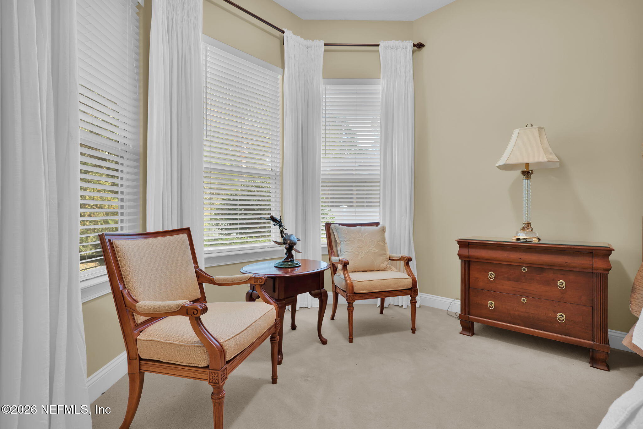 549 Sebastian Square St. Augustine, FL 32095 - Photo 23 of 51 a room with a chair and a dresser