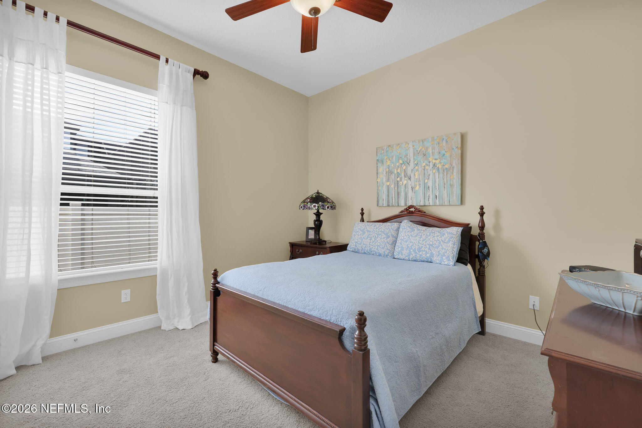 549 Sebastian Square St. Augustine, FL 32095 - Photo 28 of 51 a room with a bed and a chandelier fan