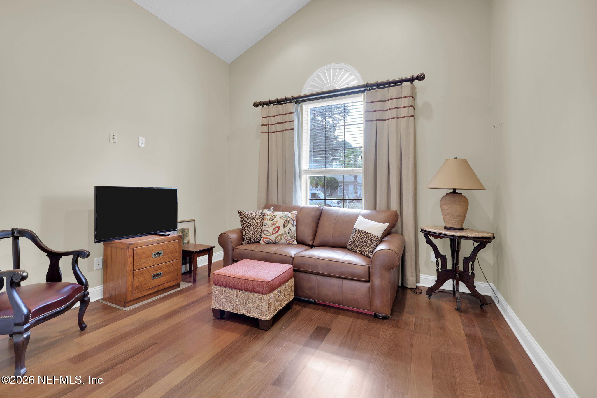549 Sebastian Square St. Augustine, FL 32095 - Photo 29 of 51 a living room with furniture and a flat screen tv