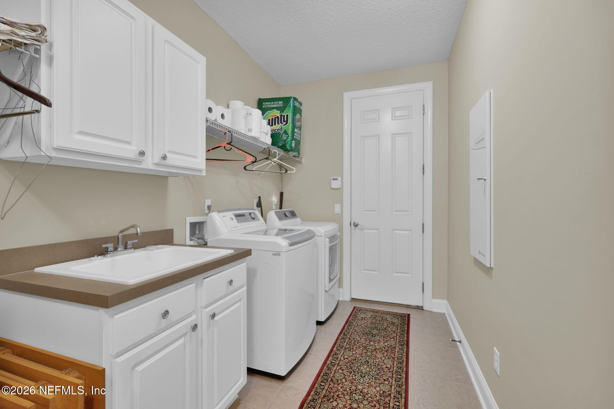 549 Sebastian Square St. Augustine, FL 32095 - Photo 31 of 51 a bathroom with a sink and a mirror