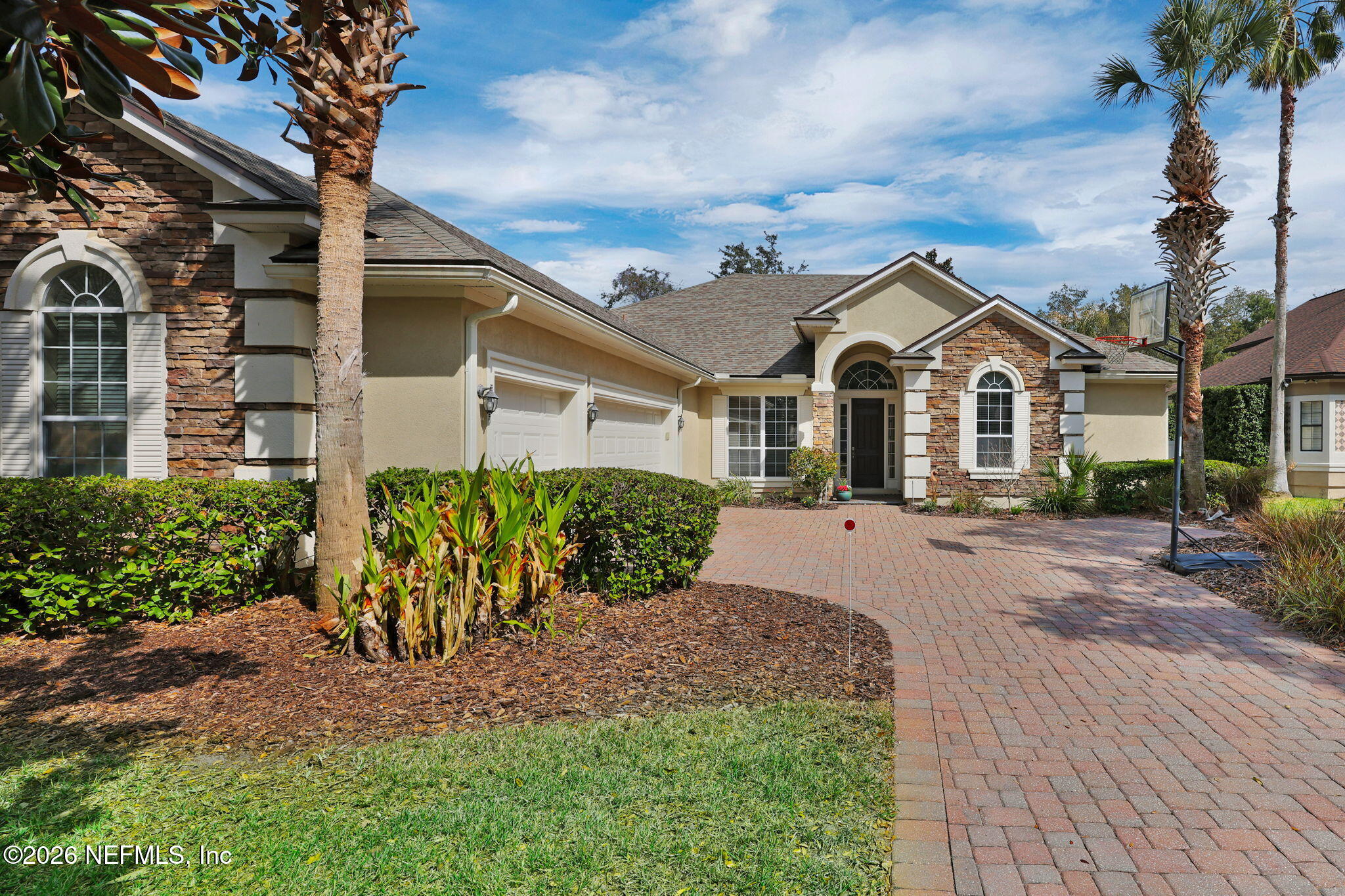 549 Sebastian Square St. Augustine, FL 32095 - Photo 4 of 51 a front view of a house with a garden