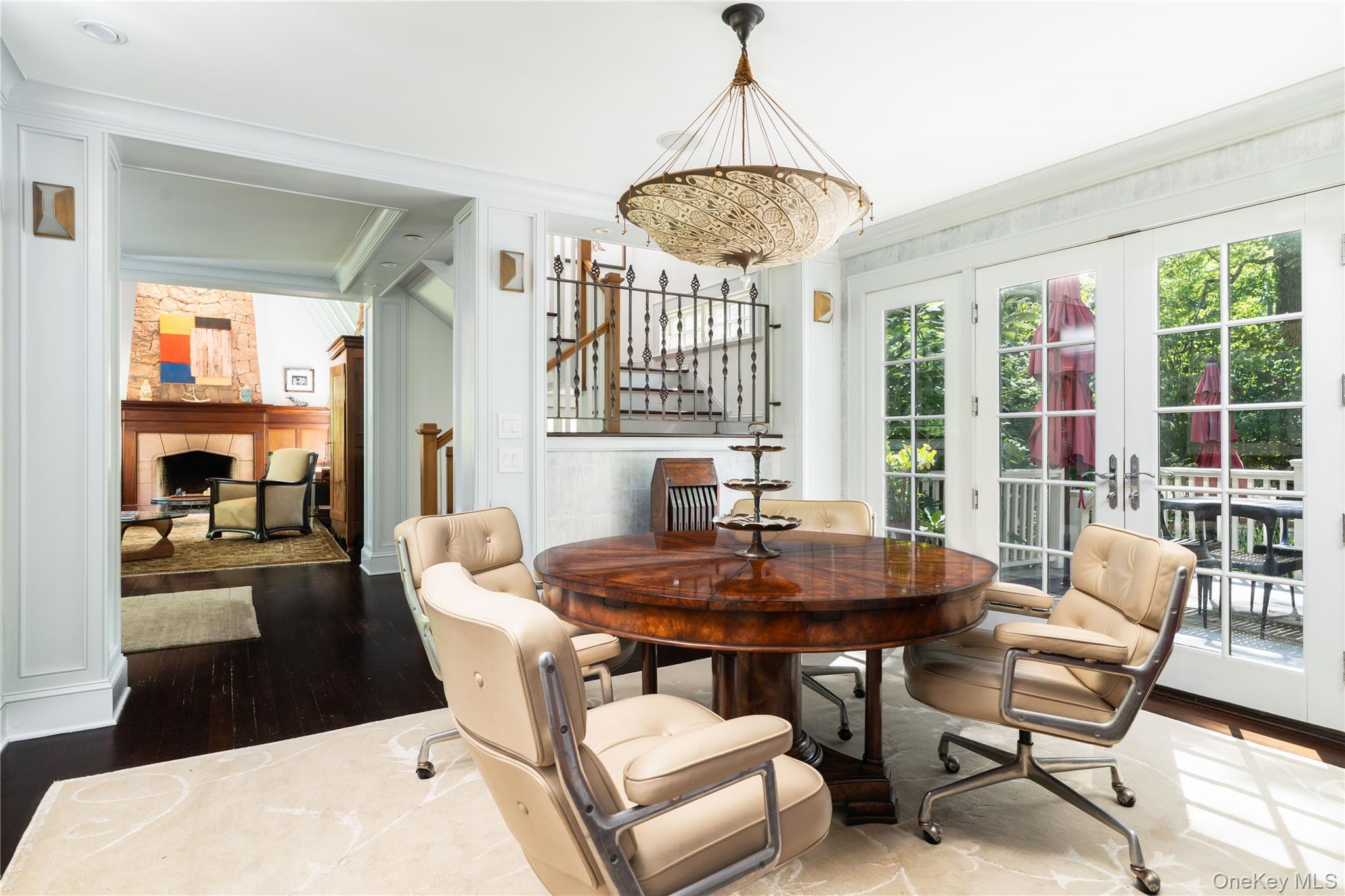 141 Washington Spring Road Palisades, NY 10964 - Photo 22 of 50 a dining room with furniture a chandelier and wooden floor