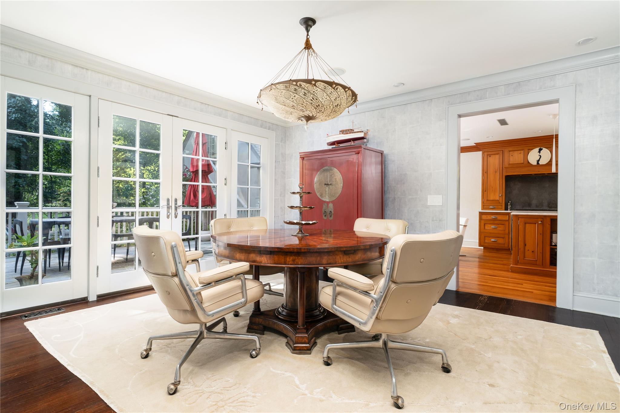 141 Washington Spring Road Palisades, NY 10964 - Photo 25 of 50 a dining room with furniture a chandelier and wooden floor