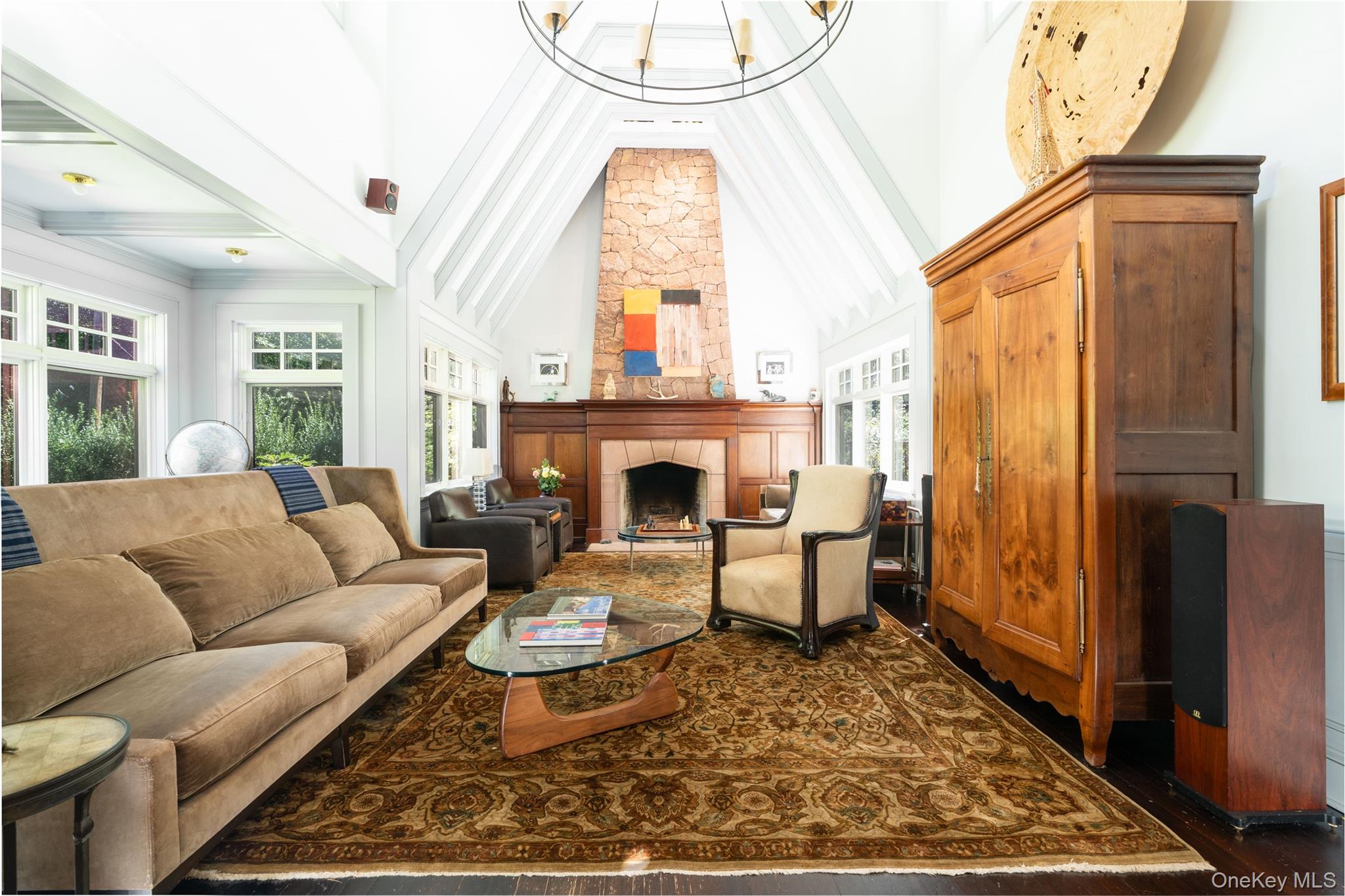 141 Washington Spring Road Palisades, NY 10964 - Photo 7 of 50 a living room with furniture a rug and a fireplace