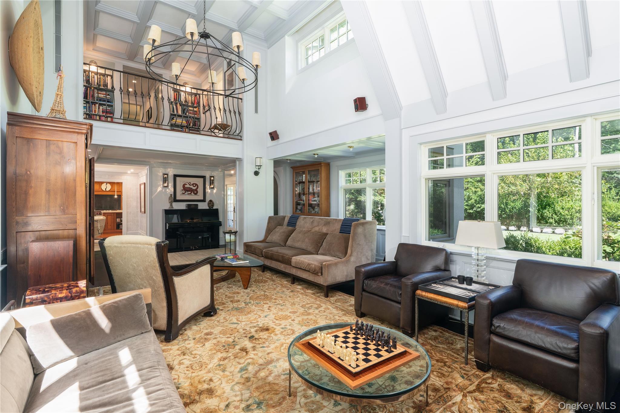 141 Washington Spring Road Palisades, NY 10964 - Photo 10 of 50 a living room with furniture a rug and a chandelier