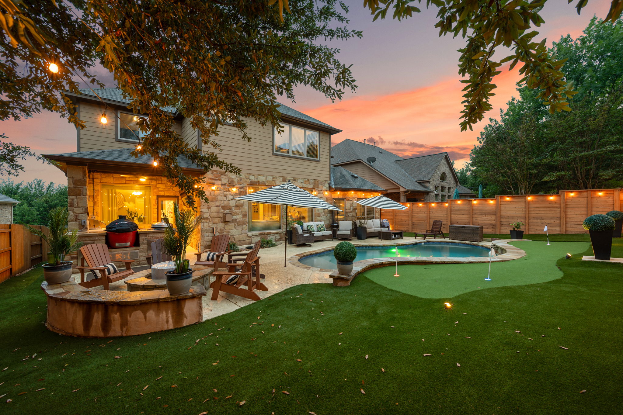 12109 Montclair Bend Austin, TX 78732 - Photo 34 of 39 Resort-style backyard featuring a custom-shaped swimming pool with flagstone coping