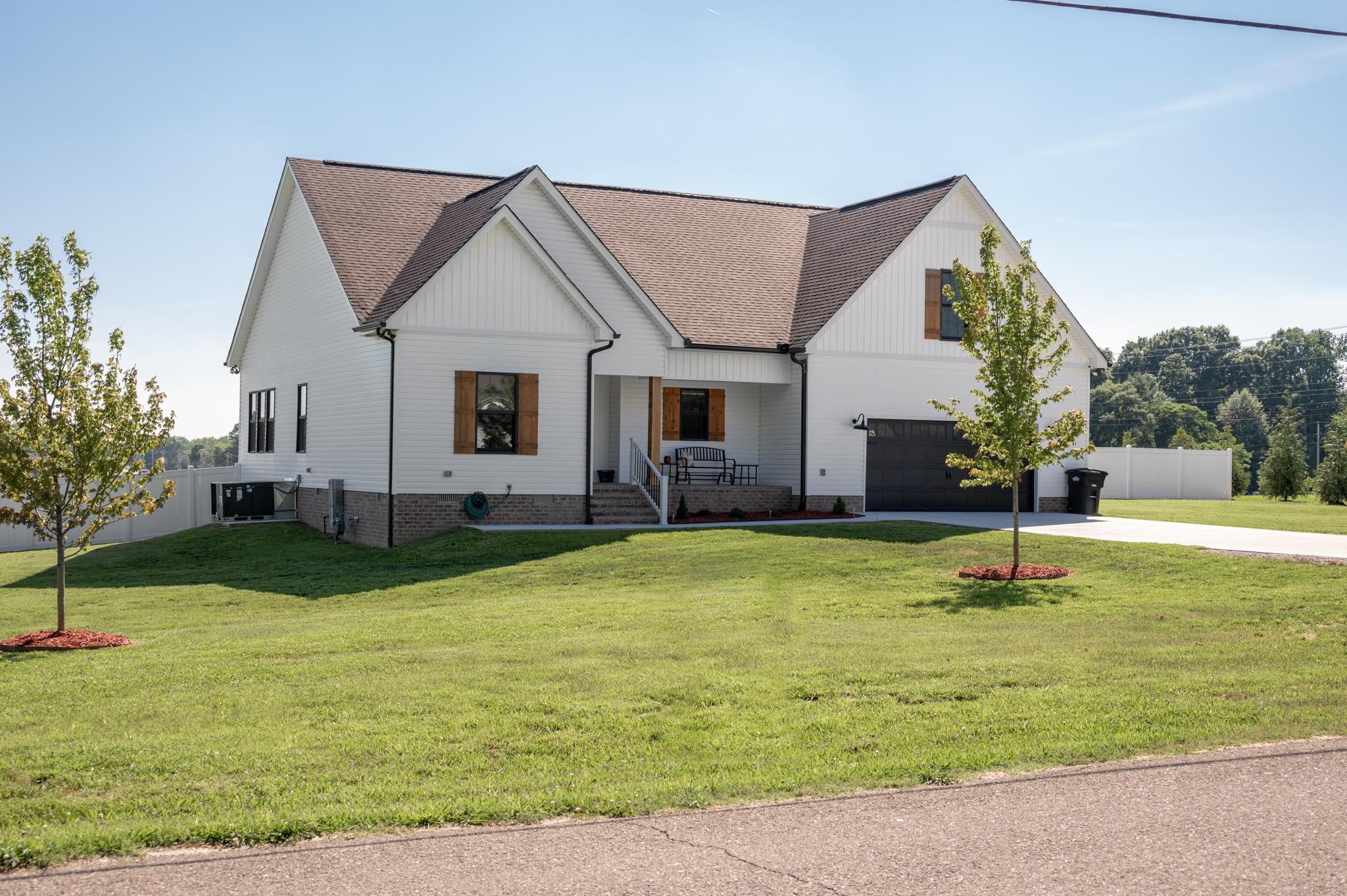 28 Taylor Road Manchester, TN 37355 - Photo 1 of 27 a house that has a big yard with plants