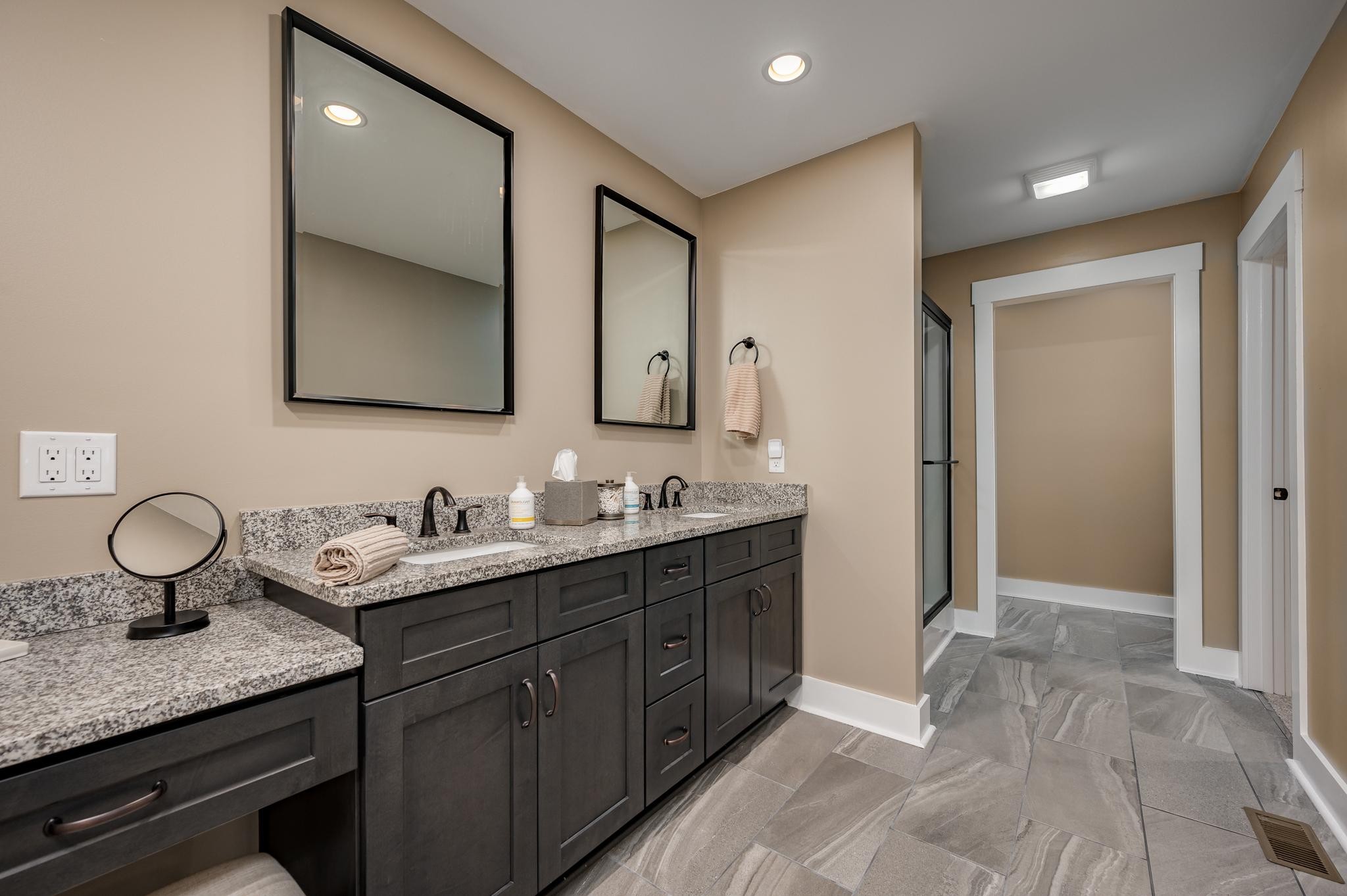 28 Taylor Road Manchester, TN 37355 - Photo 14 of 27 a bathroom with double sink and a mirror