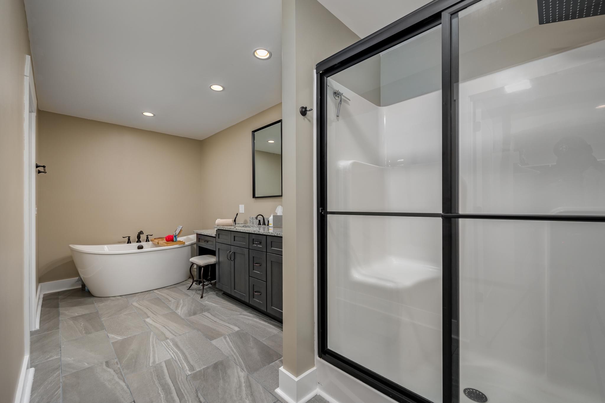 28 Taylor Road Manchester, TN 37355 - Photo 15 of 27 a bathroom with a bathtub and a shower