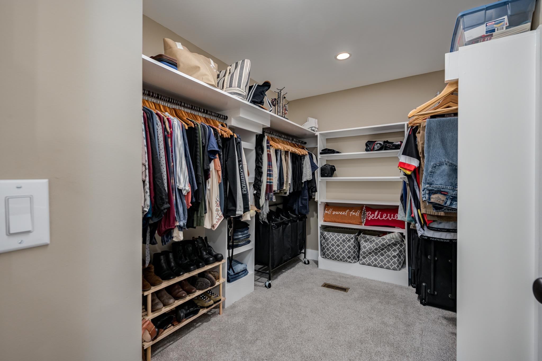 28 Taylor Road Manchester, TN 37355 - Photo 16 of 27 a view of walk in closet with clothes and shoes