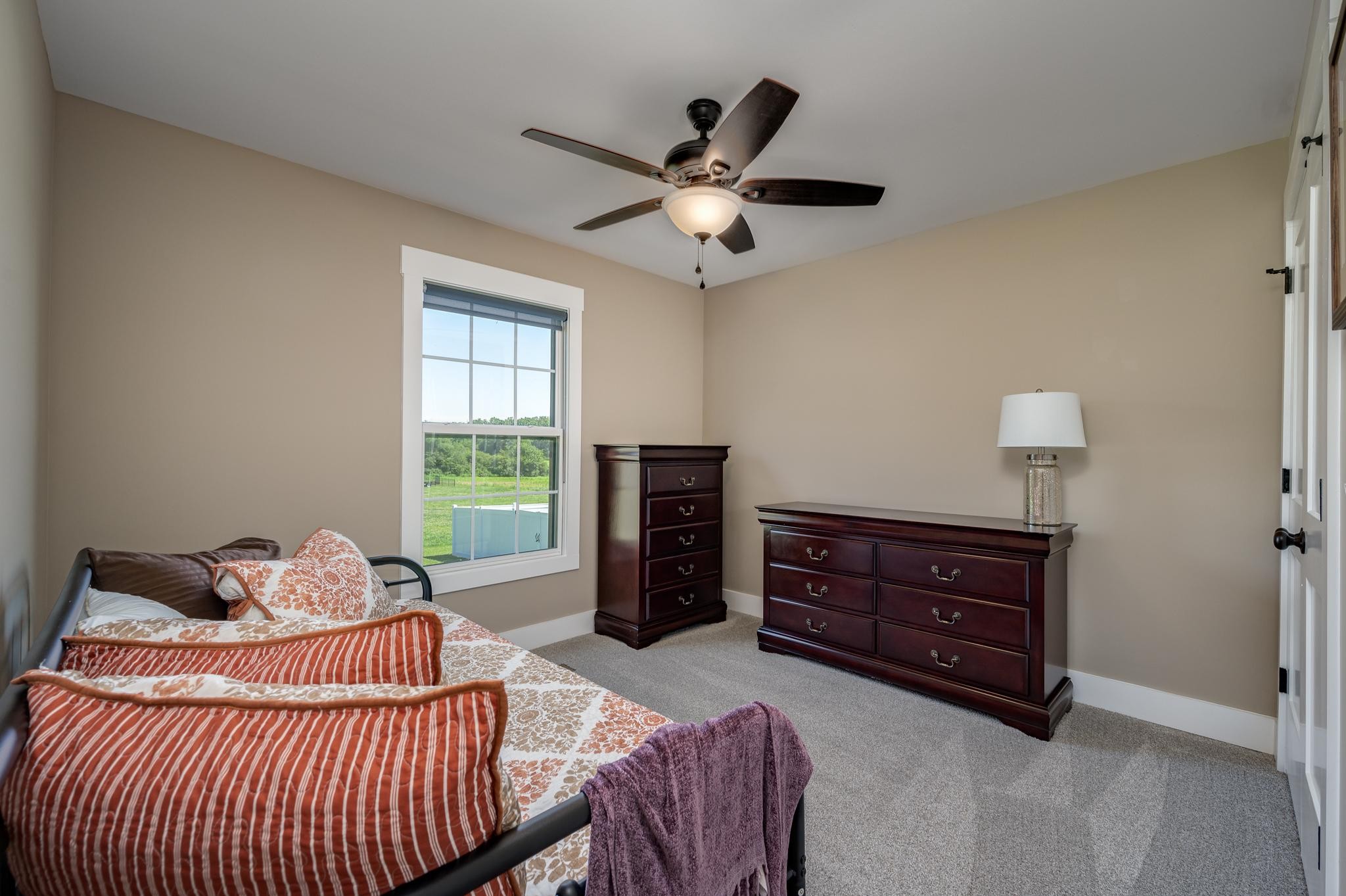 28 Taylor Road Manchester, TN 37355 - Photo 18 of 27 a bedroom with a bed and wooden floor