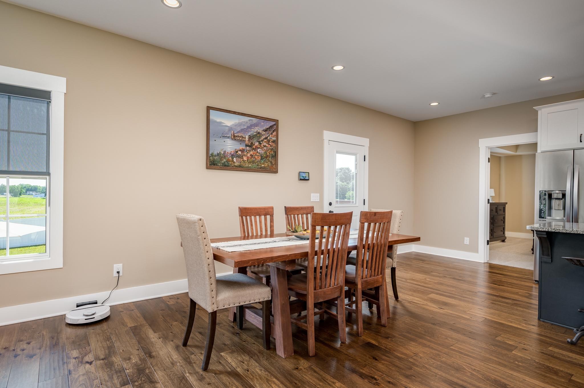 28 Taylor Road Manchester, TN 37355 - Photo 8 of 27 a view of a dining room with furniture and wooden floor