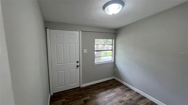 an empty room with windows