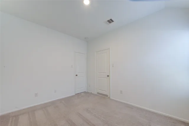 a bathroom with a sink toilet and vanity