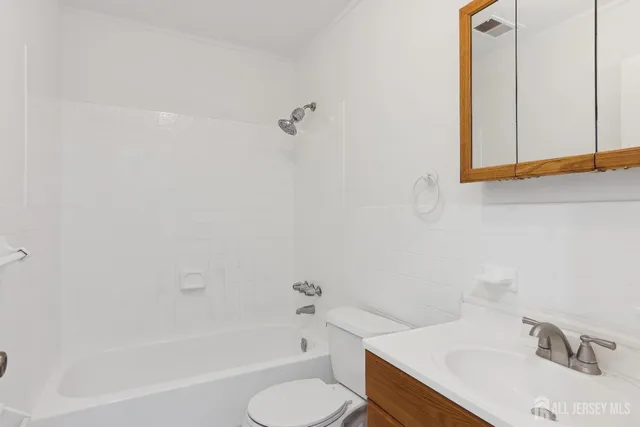 a bathroom with a sink and a bathtub