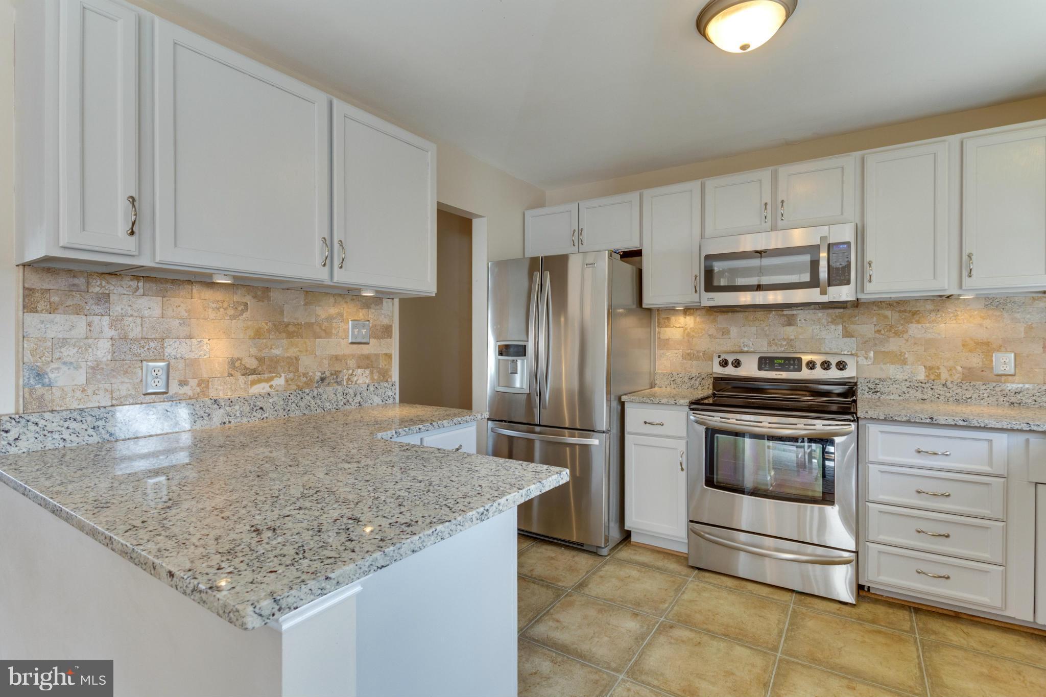 8814 Fort Hunt Road Alexandria, VA 22308 - Photo 3 of 30 Renovated open-concept kitchen