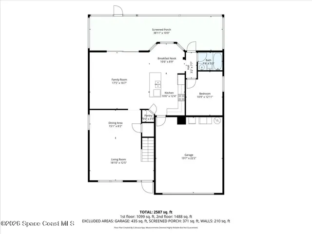 a black and white photo of a living room